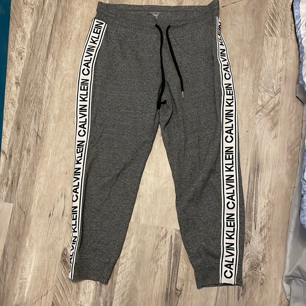 Calvin Klein joggers.